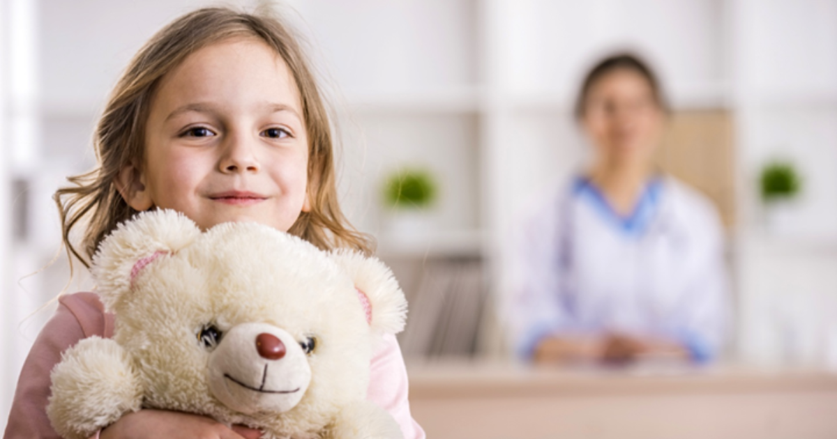 little girl with teddy bear