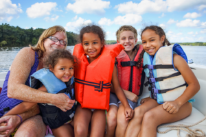 family practicing water safety