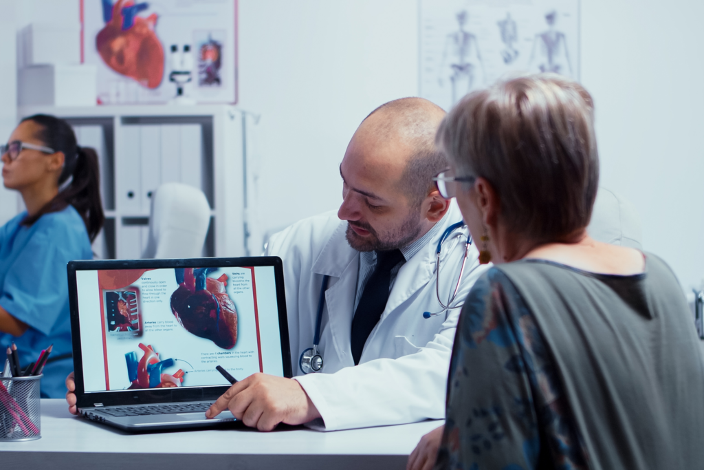 Doctor and patient discuss heart health.