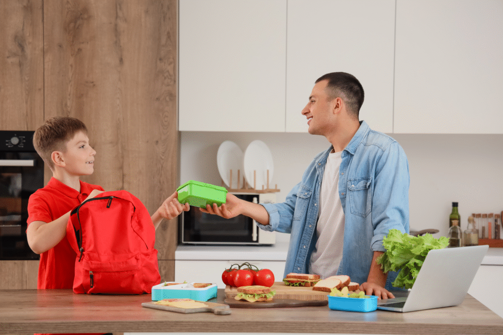 dad packing child's lunch