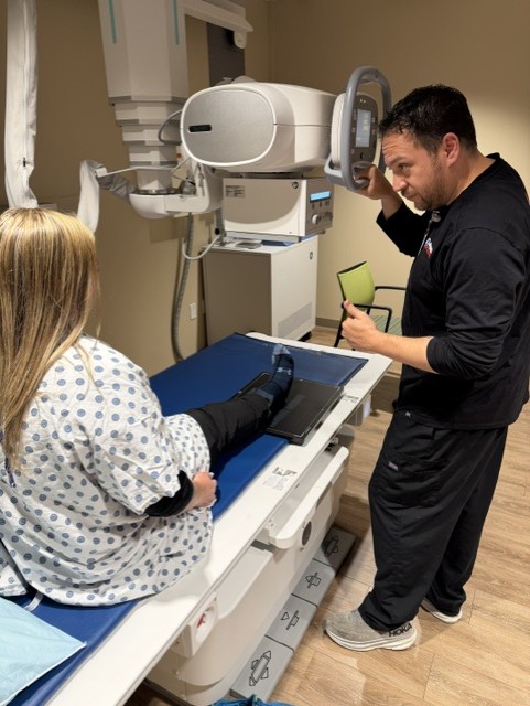 ABQ tech performs imaging on patient